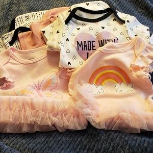 3- 6/9 m and 2- 9 m 5 PC onesies 2 brands